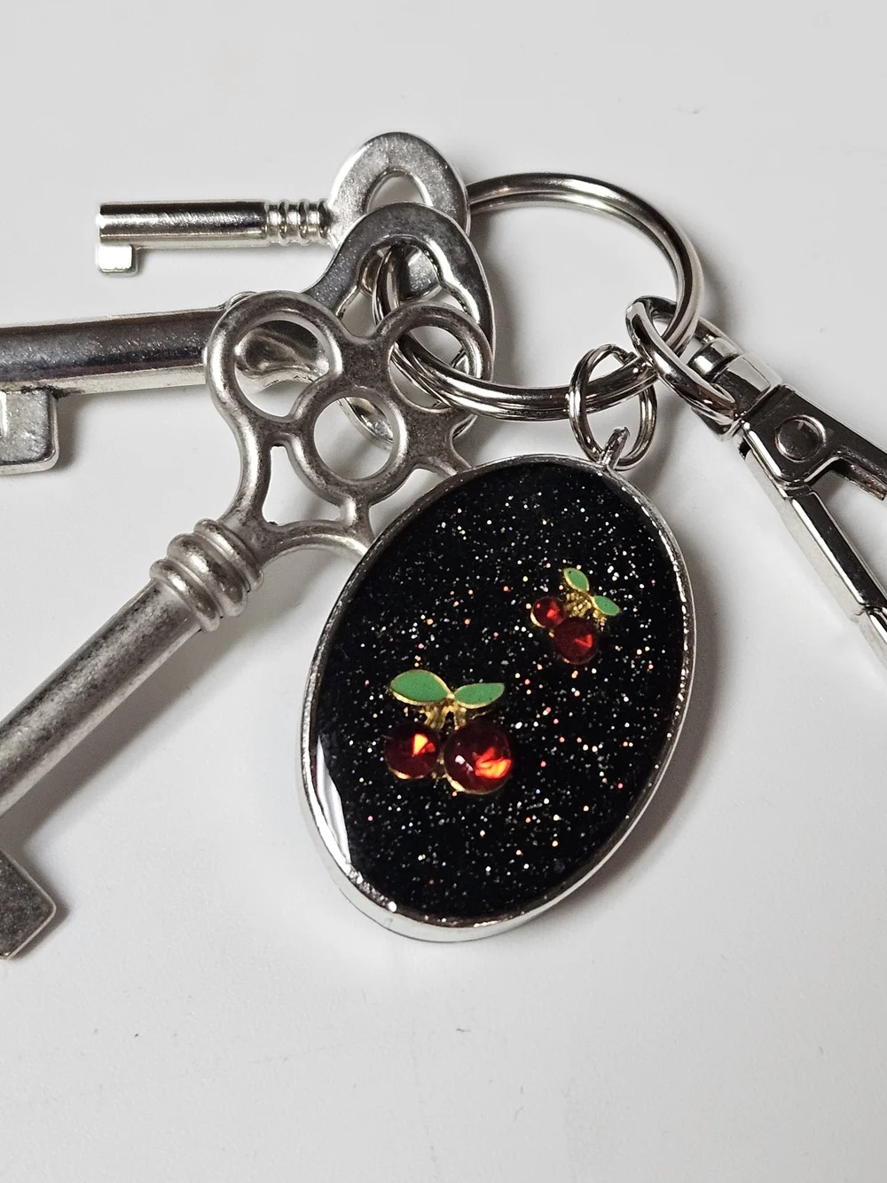 Black Glitter Oval Cherry Keychain Bag Charm
